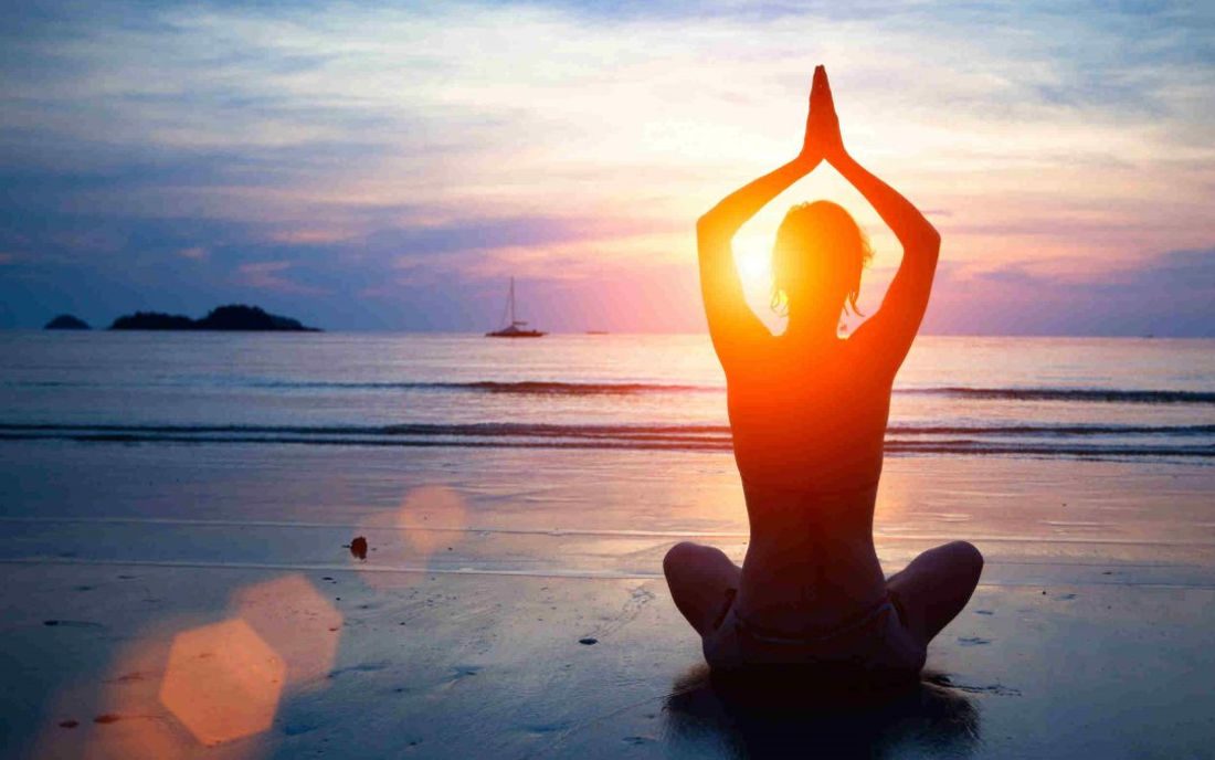 Santosa Detox Wellness Center Women Practices Yoga On The Beach