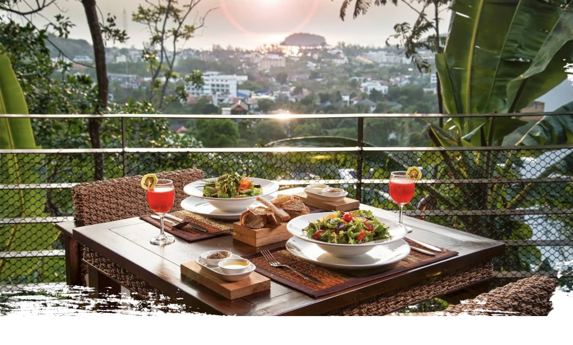 Santosa restaurant dining area surrounded by tropical gardens at Kata Beach Phuket